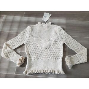 Zara  sweatshirt is brand new.